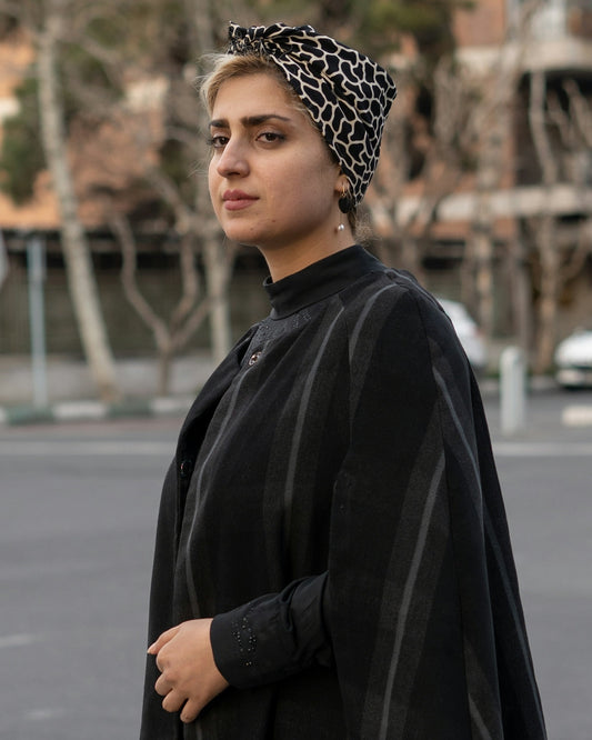 a person wearing a black jacket