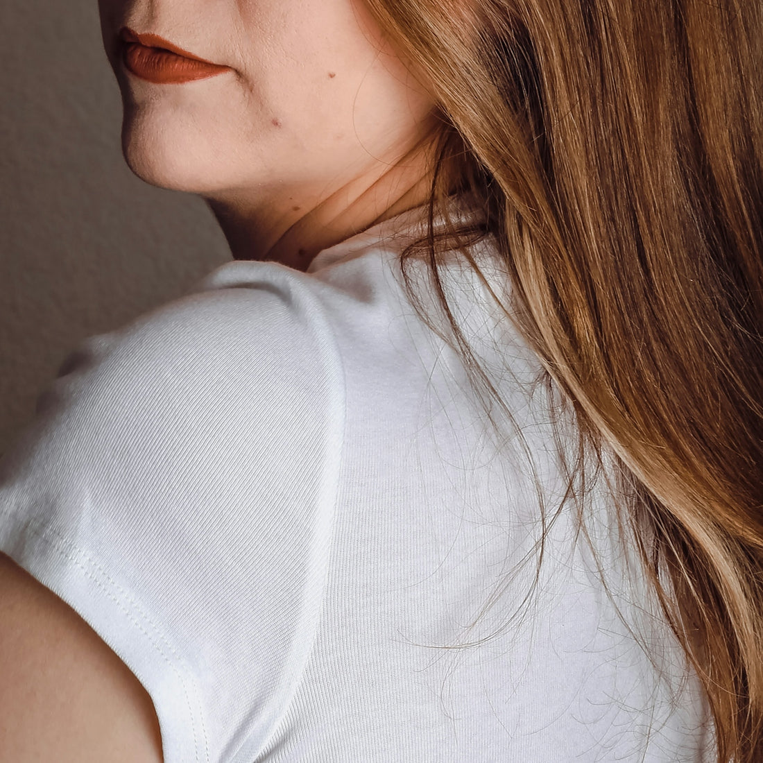 a close up of a person with long hair