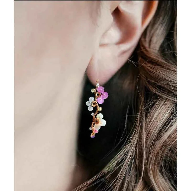 A variety of gemstone flower hoop earrings, pink sapphires, blue topaz, exquisite handcrafted gifts