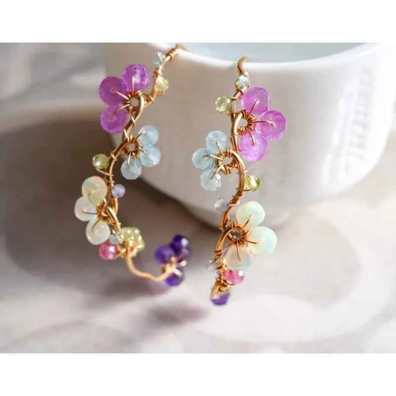 A variety of gemstone flower hoop earrings, pink sapphires, blue topaz, exquisite handcrafted gifts