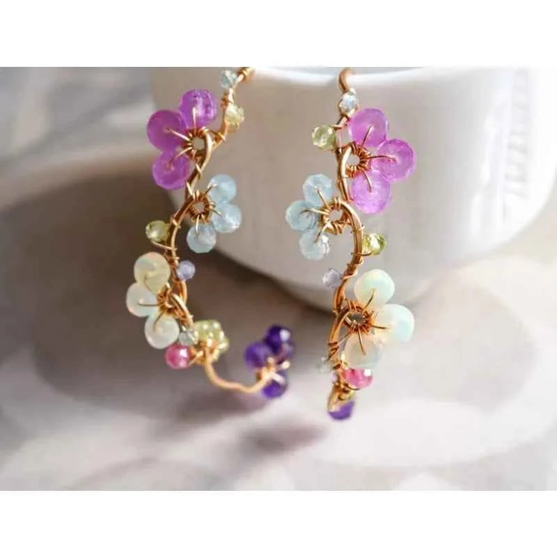 A variety of gemstone flower hoop earrings, pink sapphires, blue topaz, exquisite handcrafted gifts