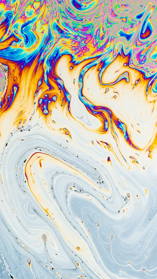 a close up of an abstract painting with colors