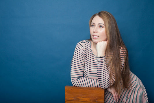 a woman standing at a podium
