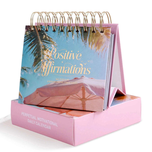 Positive affirmations desk calendar with spiral rings and pink display stand