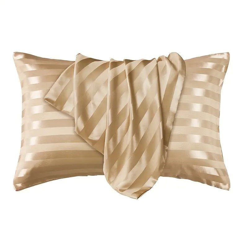 Satin Stripe Envelope Pillowcase in soft beige with elegant striped design, draped with a matching fabric.