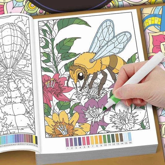 Mandala coloring book page with butterfly, flowers, and leaves, hand adding color