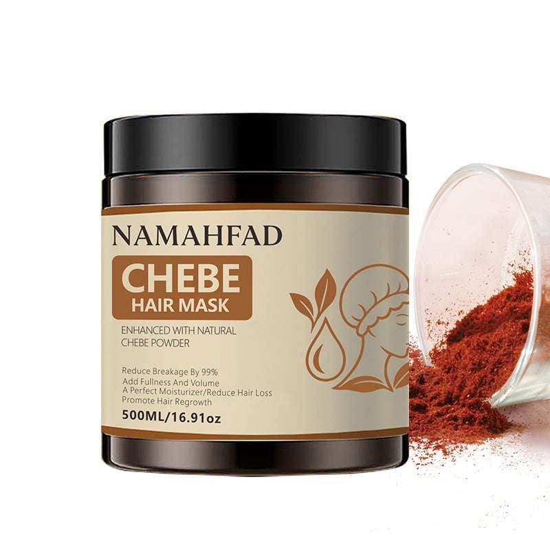 Hand scooping thick Namahfad Chebe Hair Mask from an open jar.  