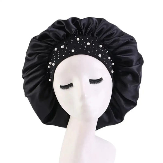 Black satin sleep bonnet with rhinestone-studded headband and wide ruffle brim.