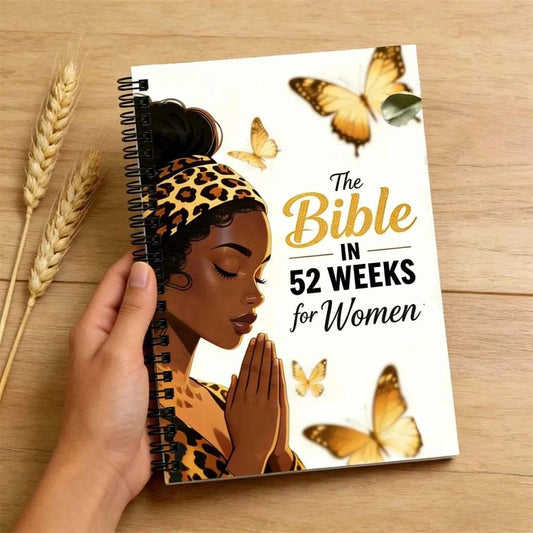 Spiral-bound scripture reading journal with butterfly cover and praying woman illustration